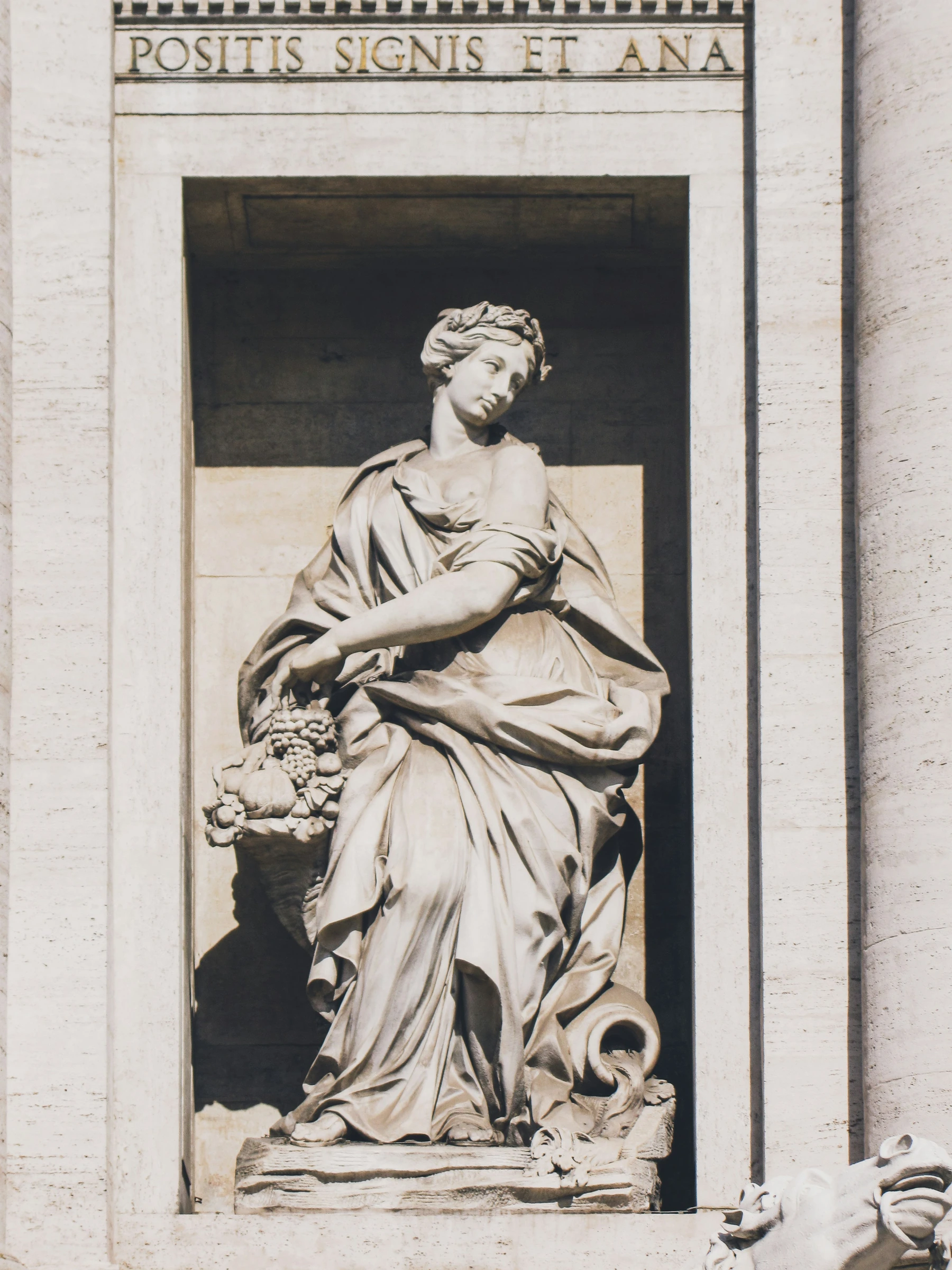 The statue of Abundance at the Trevi Fountain in Rome.