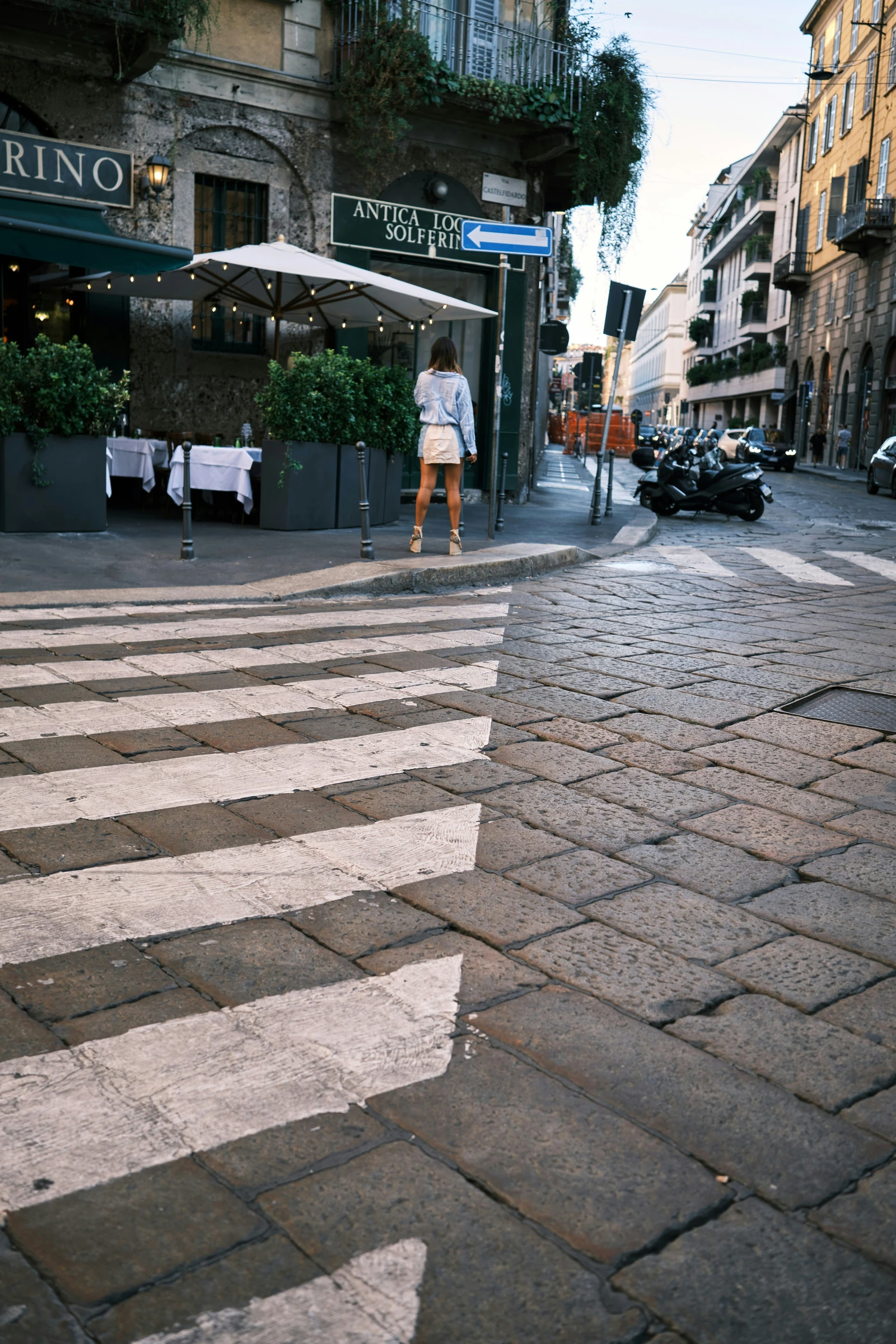 A pedestrian crossing in Milan.