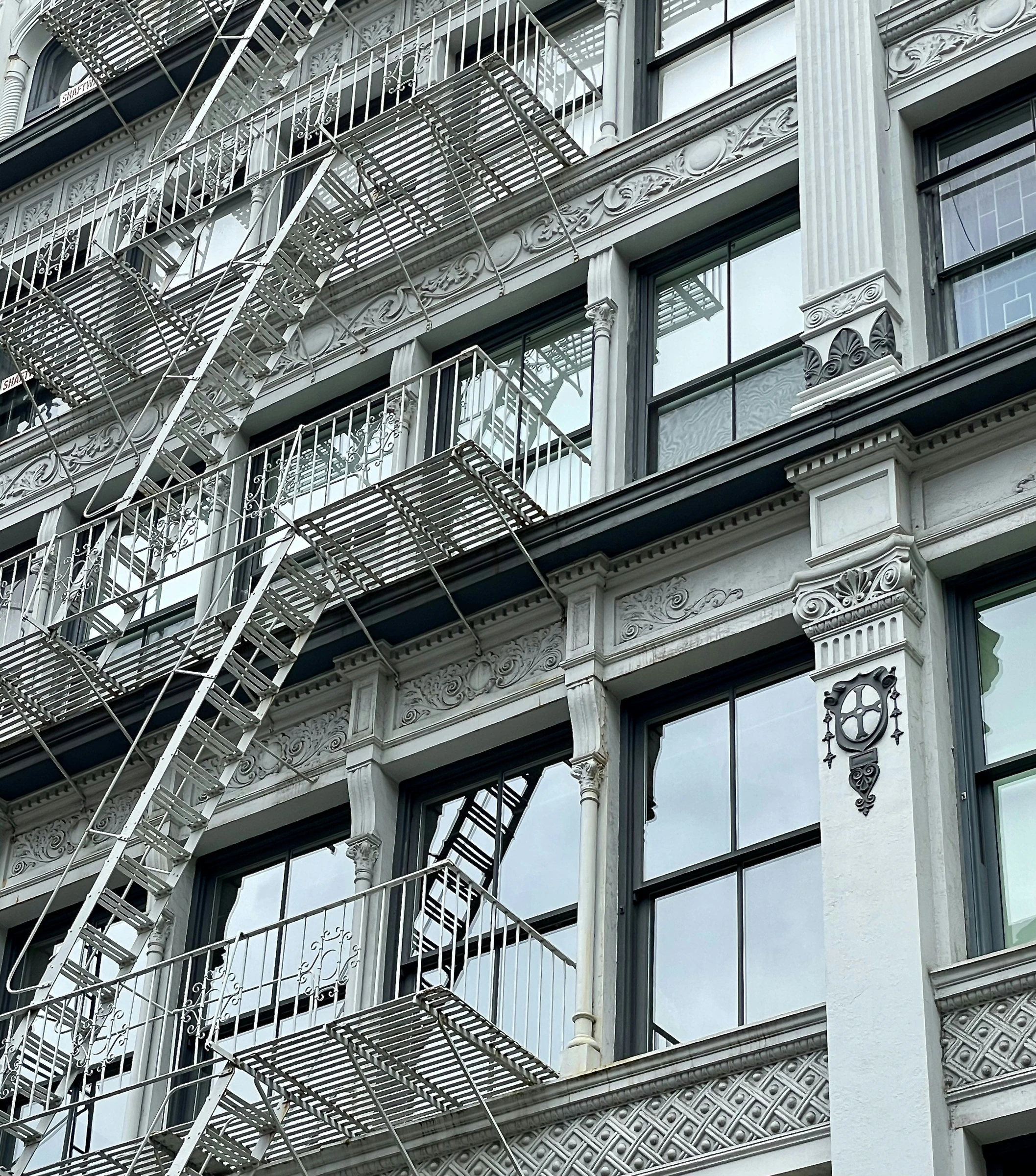 Cast-iron fa&ccedil;ade and fire escapes in SoHo, New York.